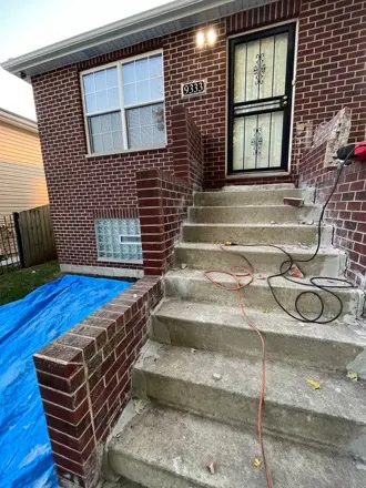 New limestone front steps under construction, South Loop Chicago